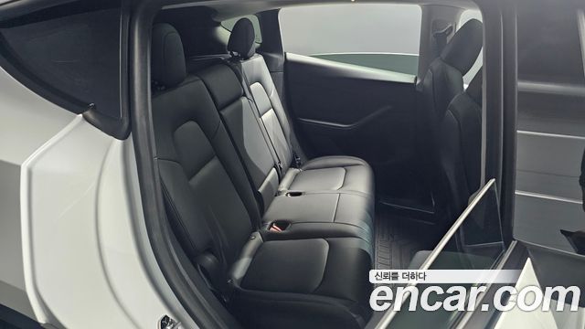 Tesla Model Y 2024 — photo 17