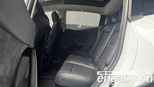 Tesla Model Y 2024 — photo 18