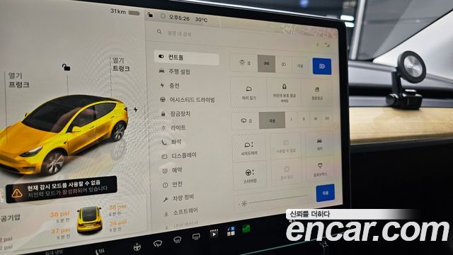 Tesla Model Y 2024 — photo 23