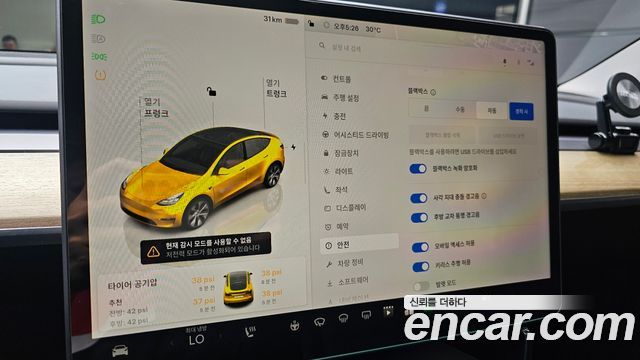 Tesla Model Y 2024 — photo 26