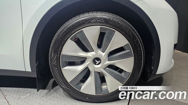 Tesla Model Y 2024 — photo 7