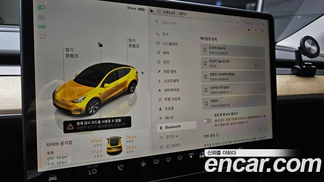 Tesla Model Y 2024 — photo 27