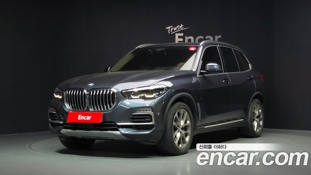 BMW X5 2021 — photo 1