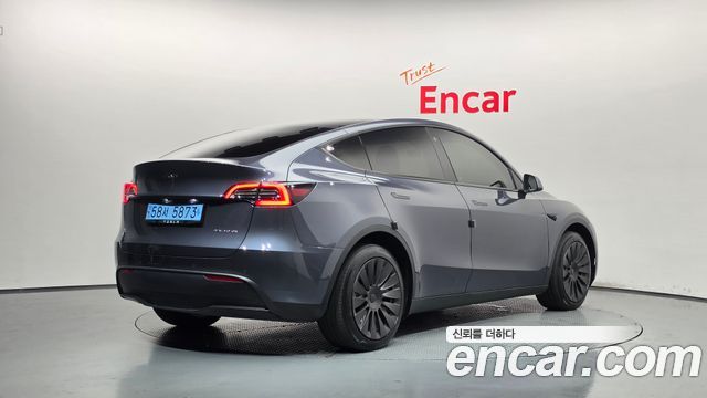 Tesla Model Y 2022 — photo 2