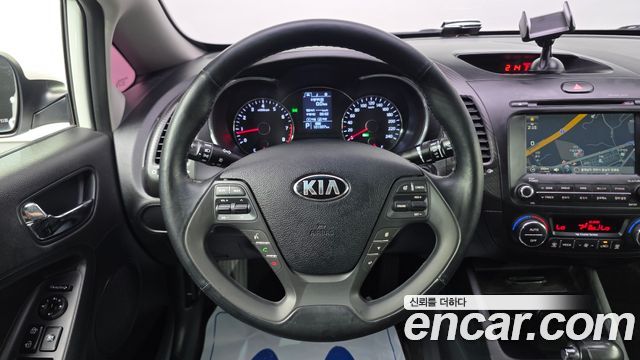 Kia K3 2015 — photo 13