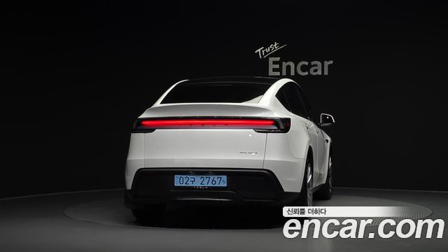 Tesla Model Y 2025 — photo 4