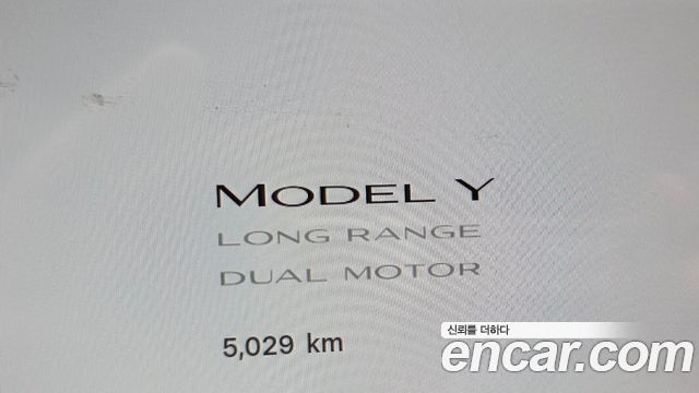 Tesla Model Y 2025 — photo 11