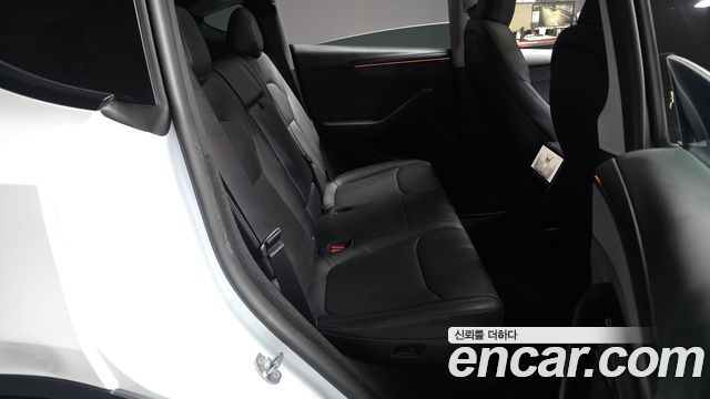 Tesla Model Y 2025 — photo 18
