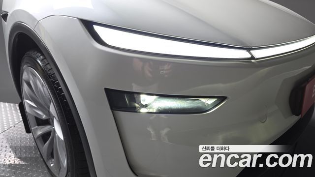 Tesla Model Y 2025 — photo 8