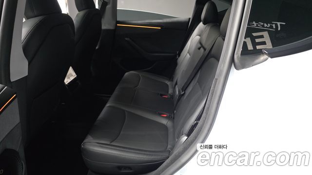 Tesla Model Y 2025 — photo 16