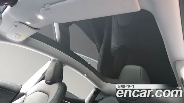 Tesla Model Y 2025 — photo 30