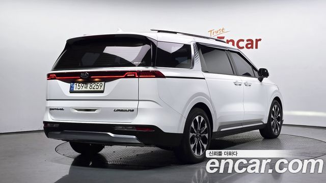 Kia Canival 2021 — photo 2