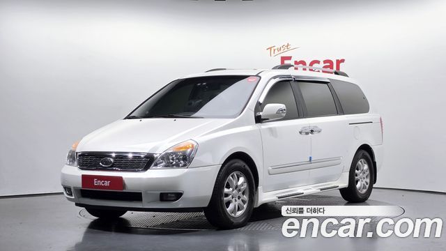 Kia Canival 2011 — photo 1