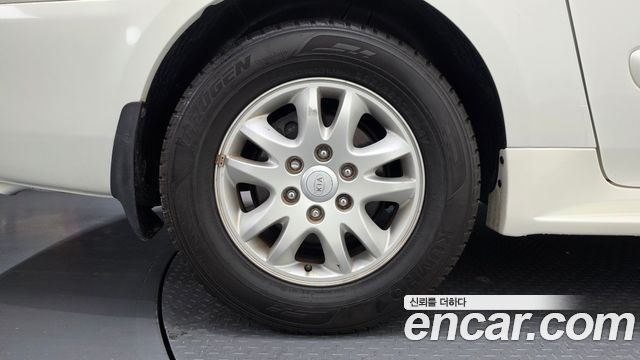 Kia Canival 2011 — photo 5