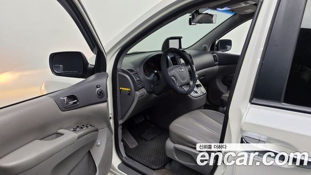 Kia Canival 2011 — photo 13
