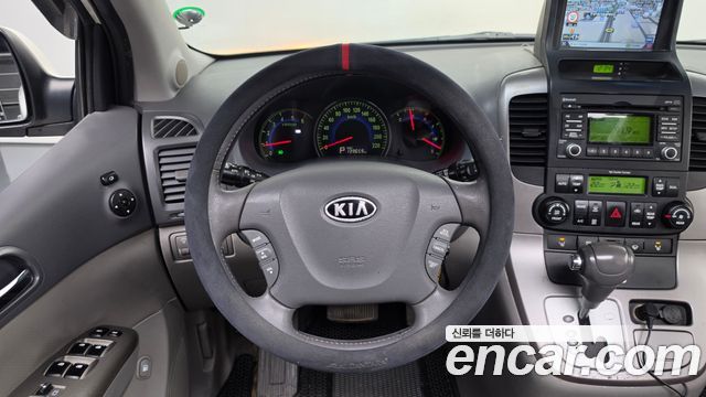 Kia Canival 2011 — photo 20