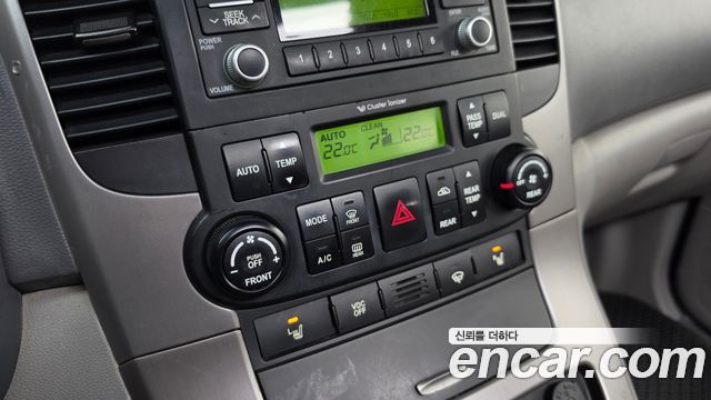 Kia Canival 2011 — photo 26