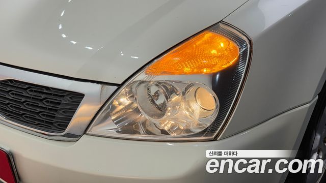 Kia Canival 2011 — photo 8