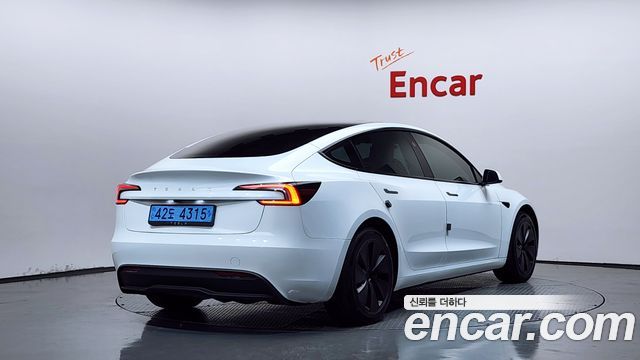 Tesla Model 3 2024 — photo 2