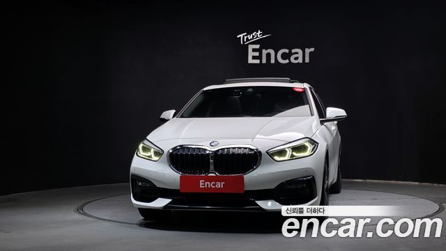BMW 1-Series 2021 — photo 1