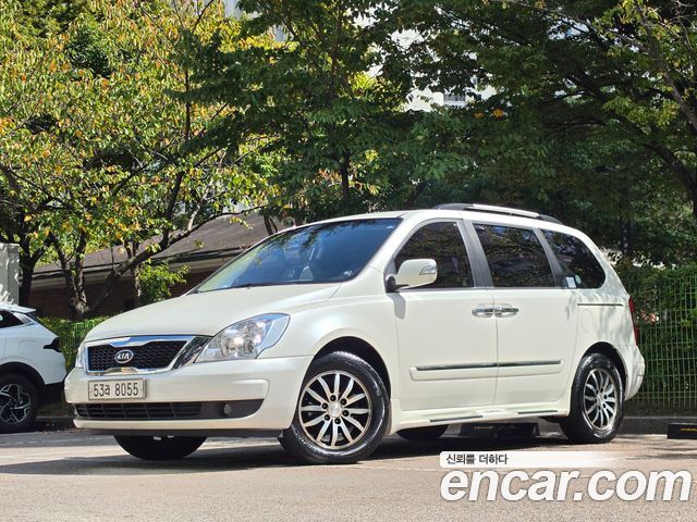 Kia Canival 2010 — photo 1