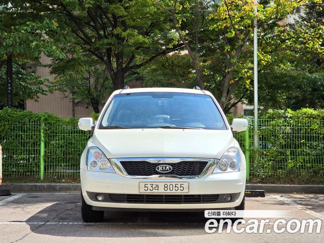 Kia Canival 2010 — photo 2