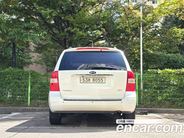 Kia Canival 2010 — photo 3
