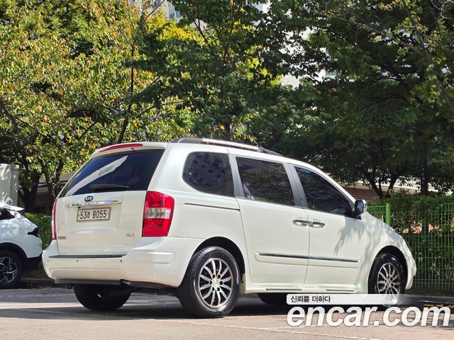 Kia Canival 2010 — photo 4