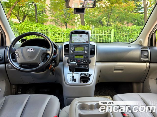 Kia Canival 2010 — photo 5