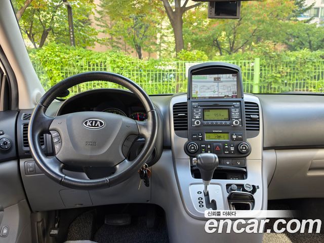 Kia Canival 2010 — photo 6