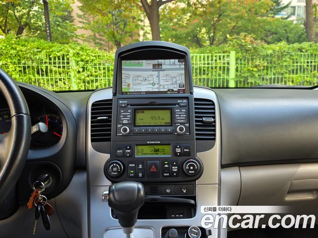 Kia Canival 2010 — photo 7
