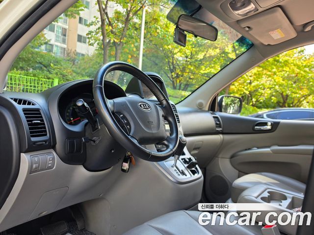 Kia Canival 2010 — photo 13