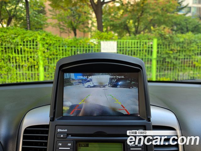 Kia Canival 2010 — photo 16