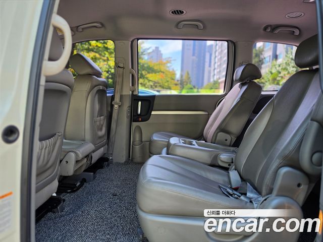 Kia Canival 2010 — photo 17