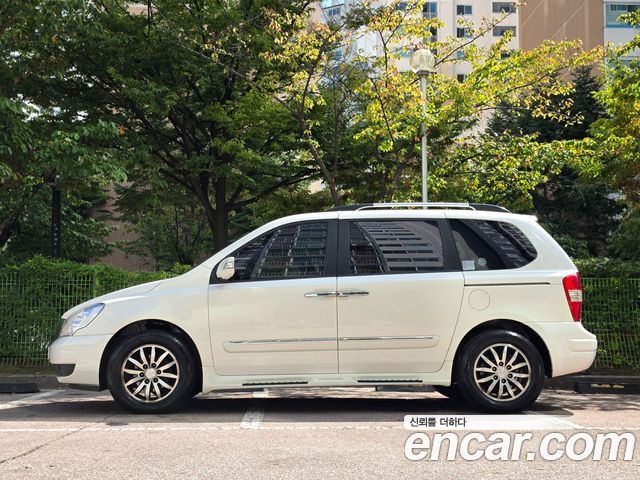 Kia Canival 2010 — photo 19