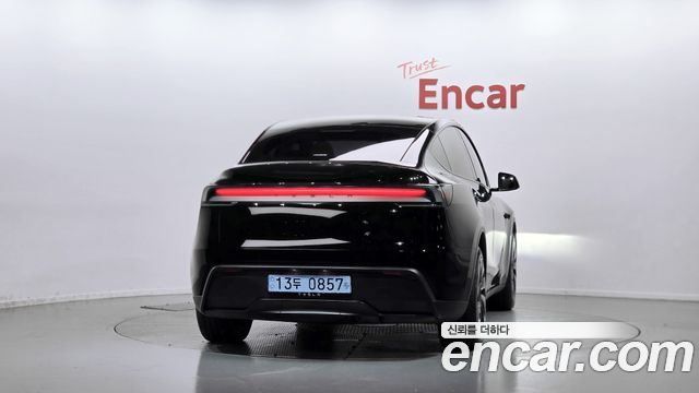 Tesla Model Y 2025 — photo 4