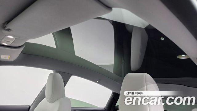 Tesla Model Y 2025 — photo 32