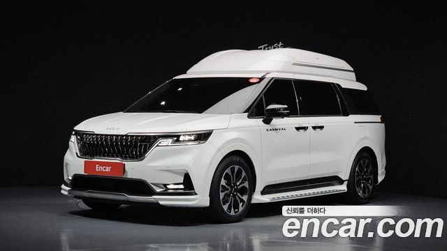 Kia Canival 2023 — photo 1