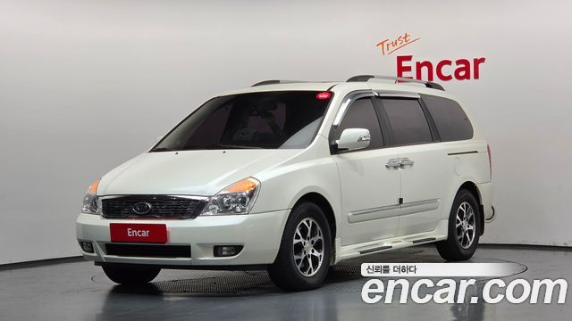 Kia Canival 2011 — photo 1