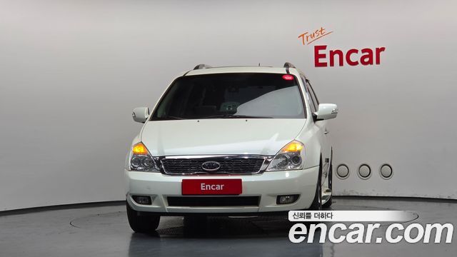 Kia Canival 2011 — photo 3