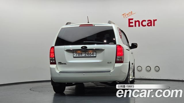 Kia Canival 2011 — photo 4
