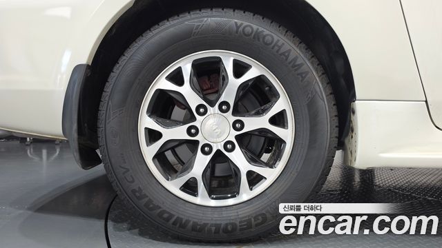 Kia Canival 2011 — photo 5