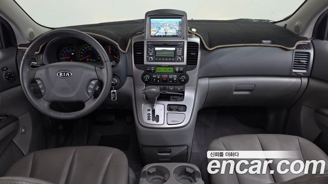 Kia Canival 2011 — photo 7