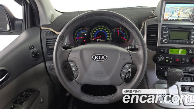 Kia Canival 2011 — photo 13