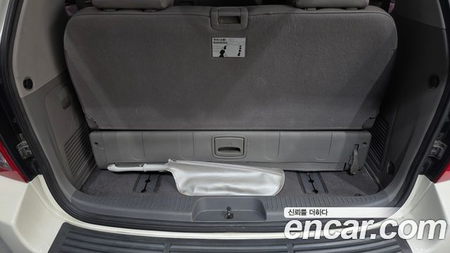 Kia Canival 2011 — photo 20