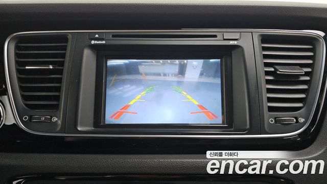 Kia Canival 2015 — photo 13