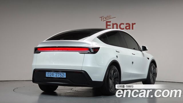 Tesla Model Y 2025 — photo 2