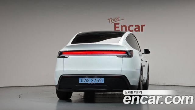Tesla Model Y 2025 — photo 4