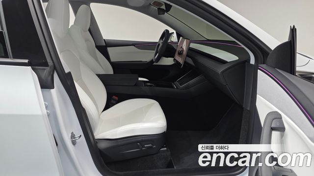 Tesla Model Y 2025 — photo 17