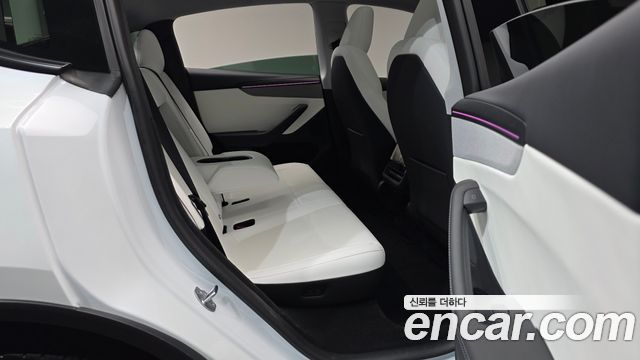 Tesla Model Y 2025 — photo 18